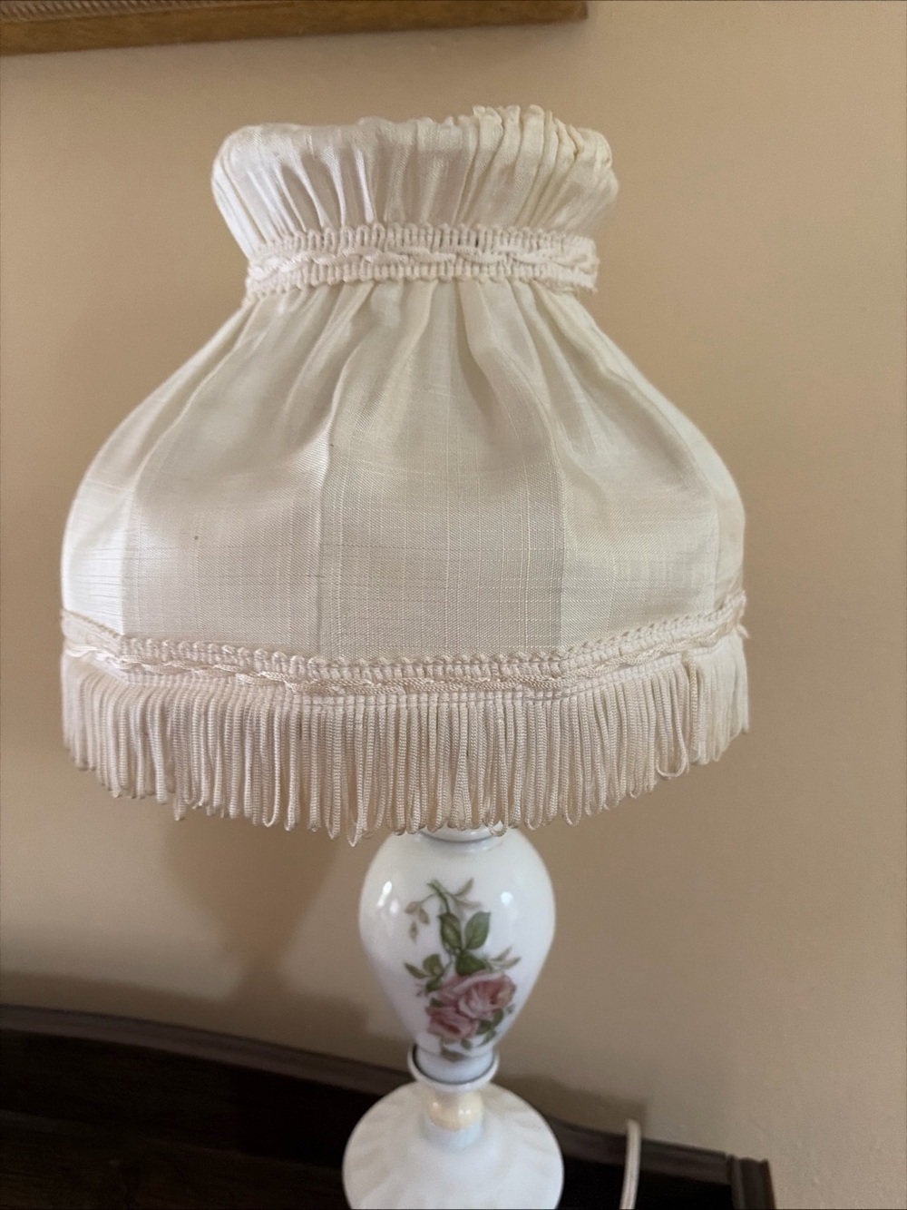 Vintage ceramic lamp with vintage 7” shade and roses on body of lamp which works